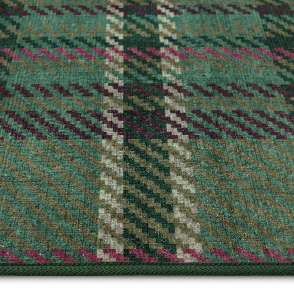 Isla Plaid Emerald Green Eco-Washable rug- a tartan rug in various shades of green.