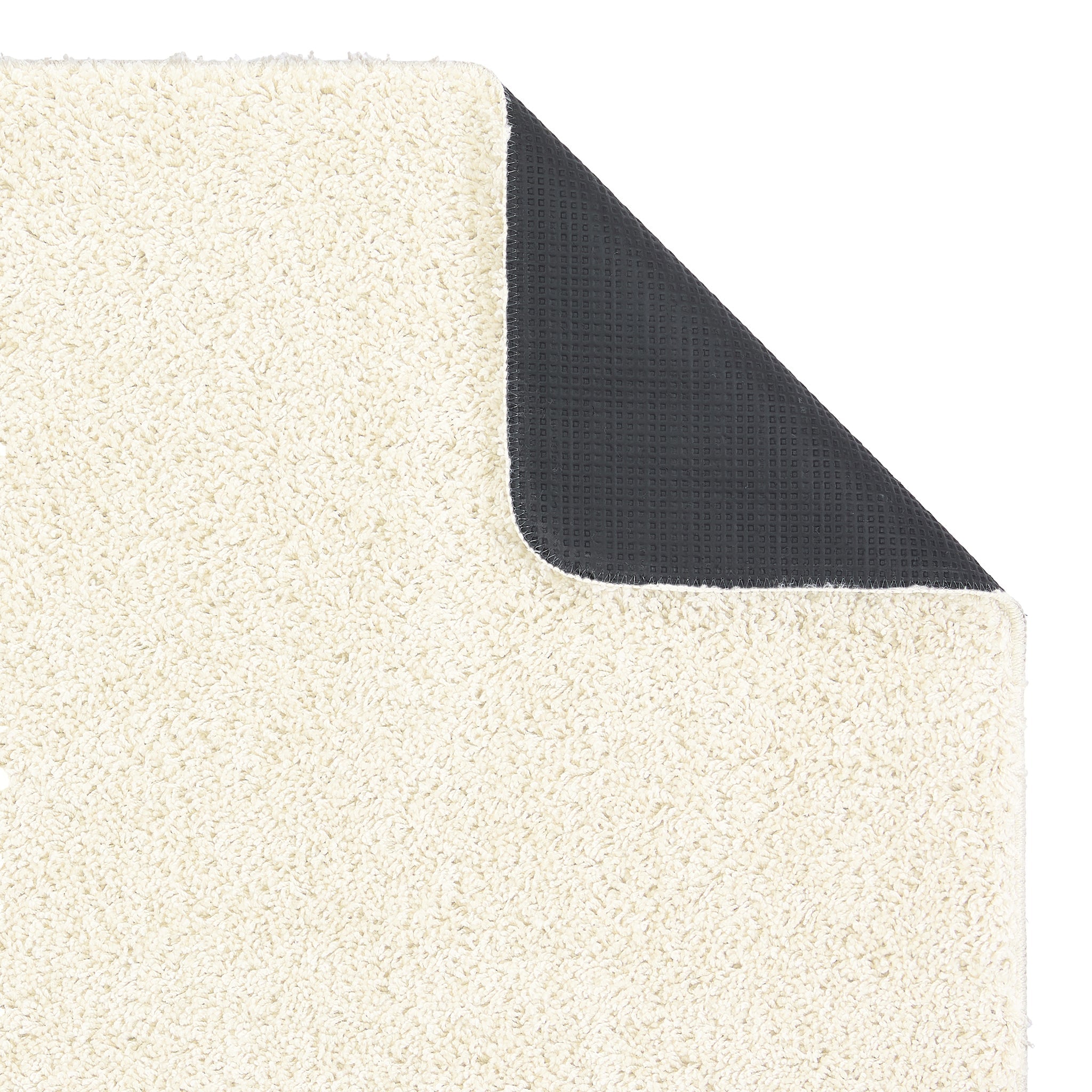 Ivory Washable Rug in a solid white colour, fully machine washable.
