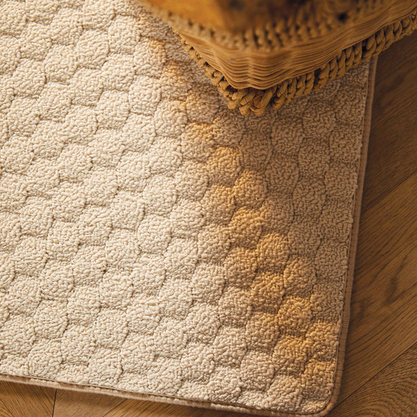 Sculptured Washable Ivory Rug made from polypropene, featuring a woven design.