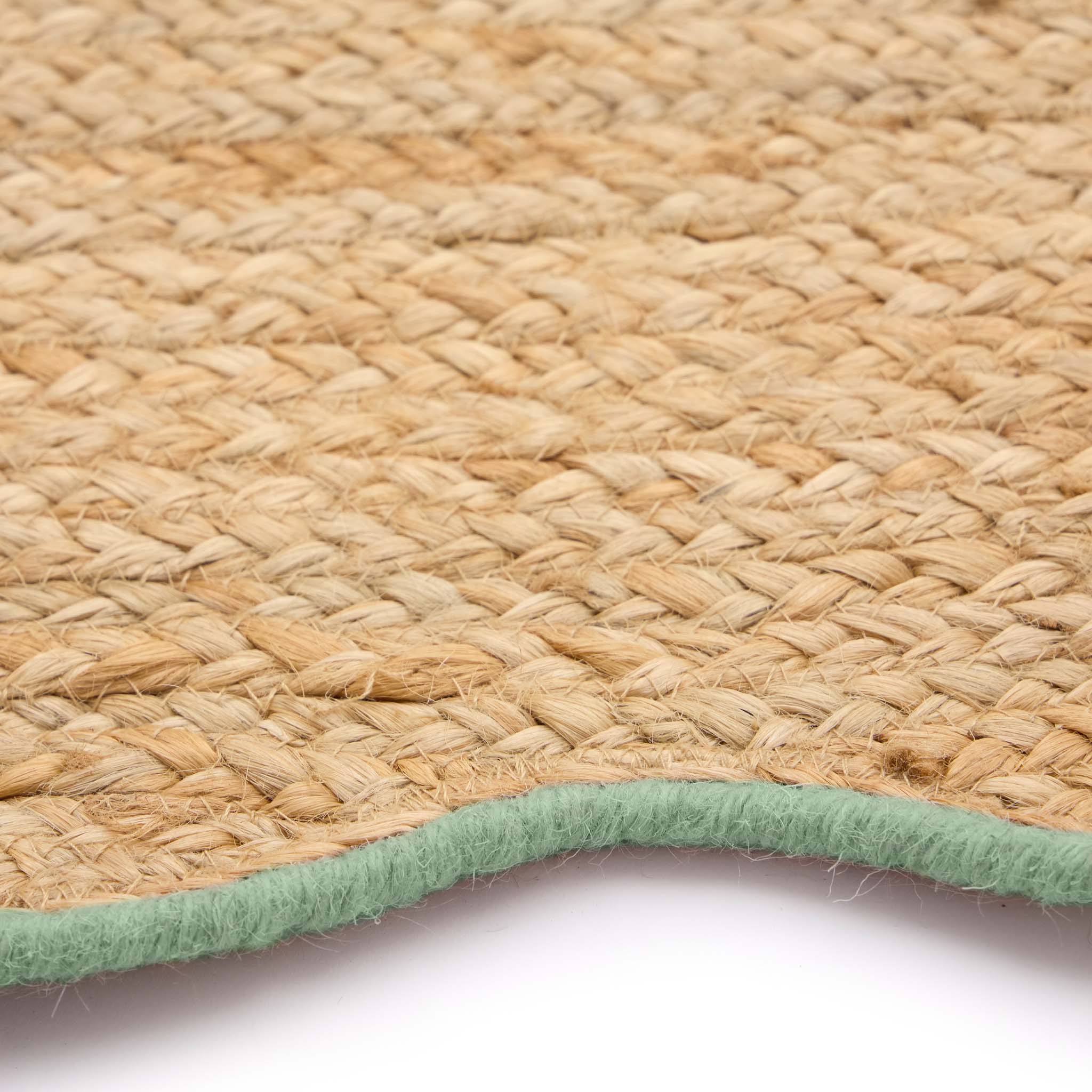 Jute Scalloped Edge Green Runner - a 100% jute runner featuring a green scalloped border.