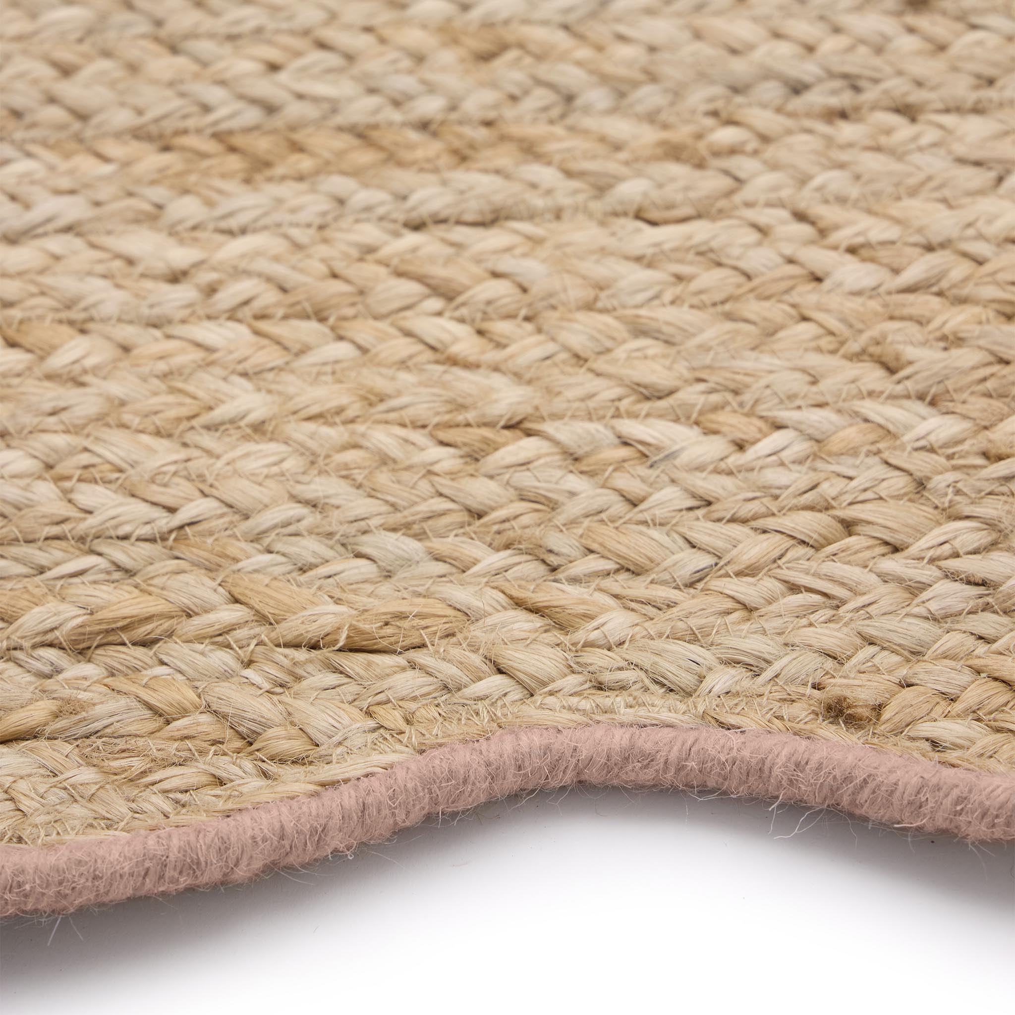 Jute Scalloped Edge Peach Rug- Jute rug wth a pink wool wiped scalloped edge.