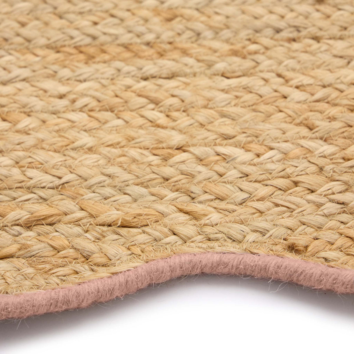 Jute Scalloped Edge Peach Rug - a 100% jute rug featuring a pink scalloped border.