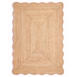 Jute Scalloped Edge Peach Rug- Jute rug wth a pink wool wiped scalloped edge.