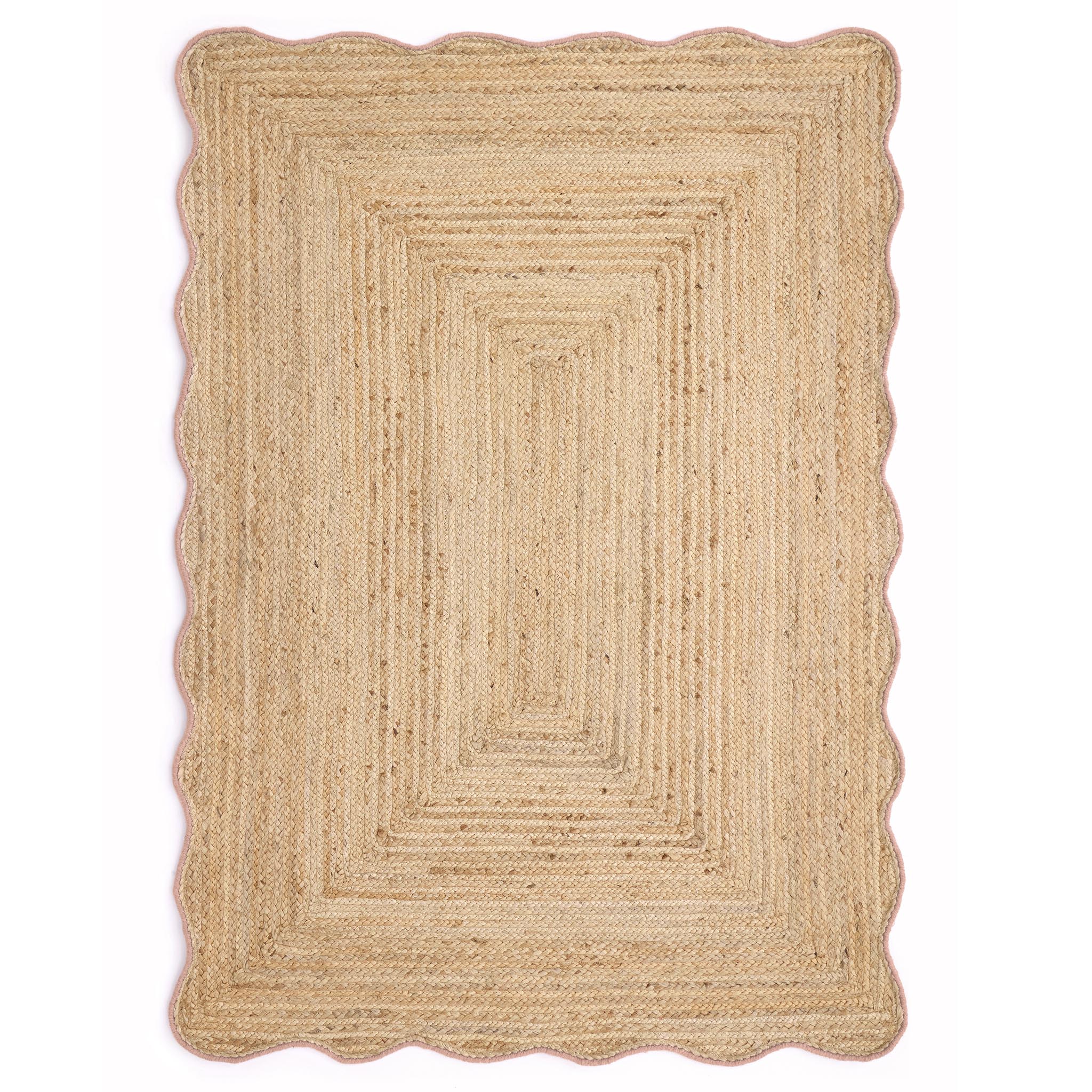 Jute Scalloped Edge Peach Rug- Jute rug wth a pink wool wiped scalloped edge.