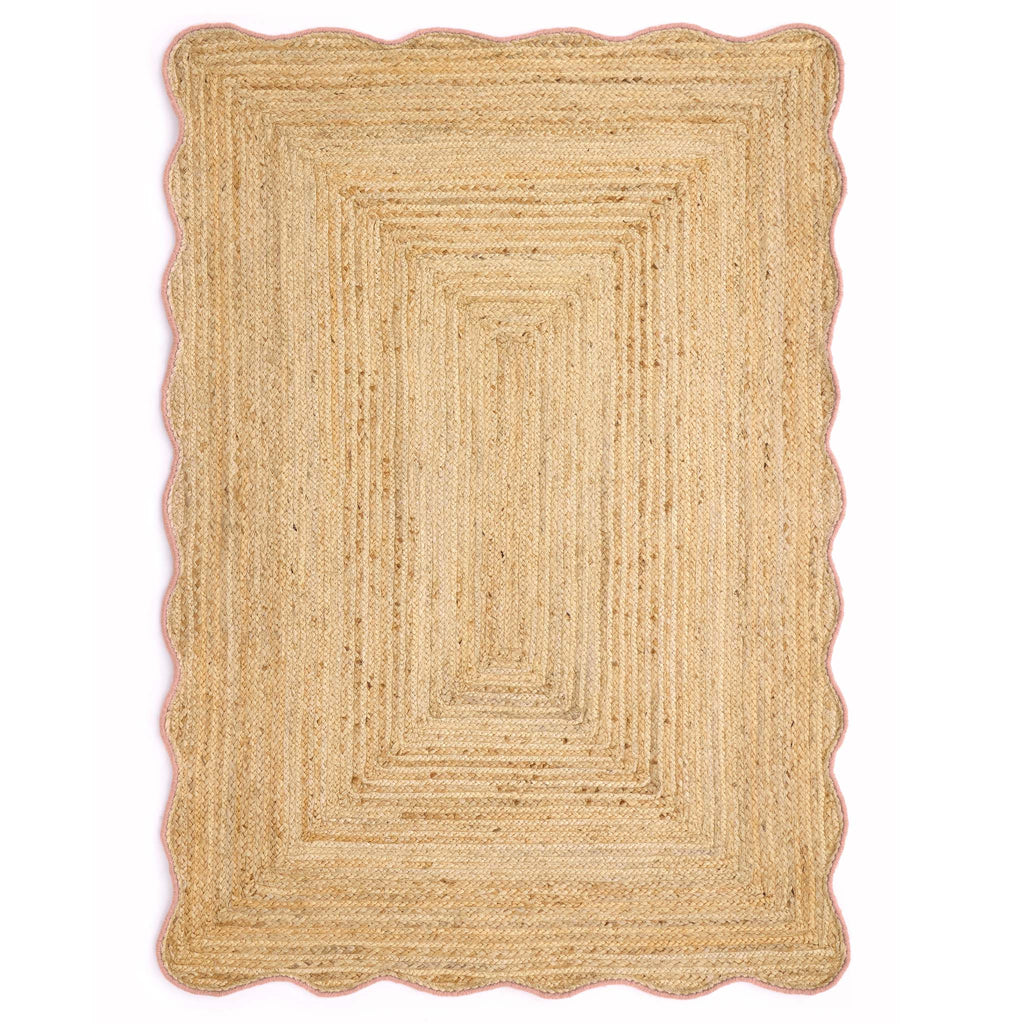 Jute Scalloped Edge Peach Rug - a 100% jute rug featuring a pink scalloped border.