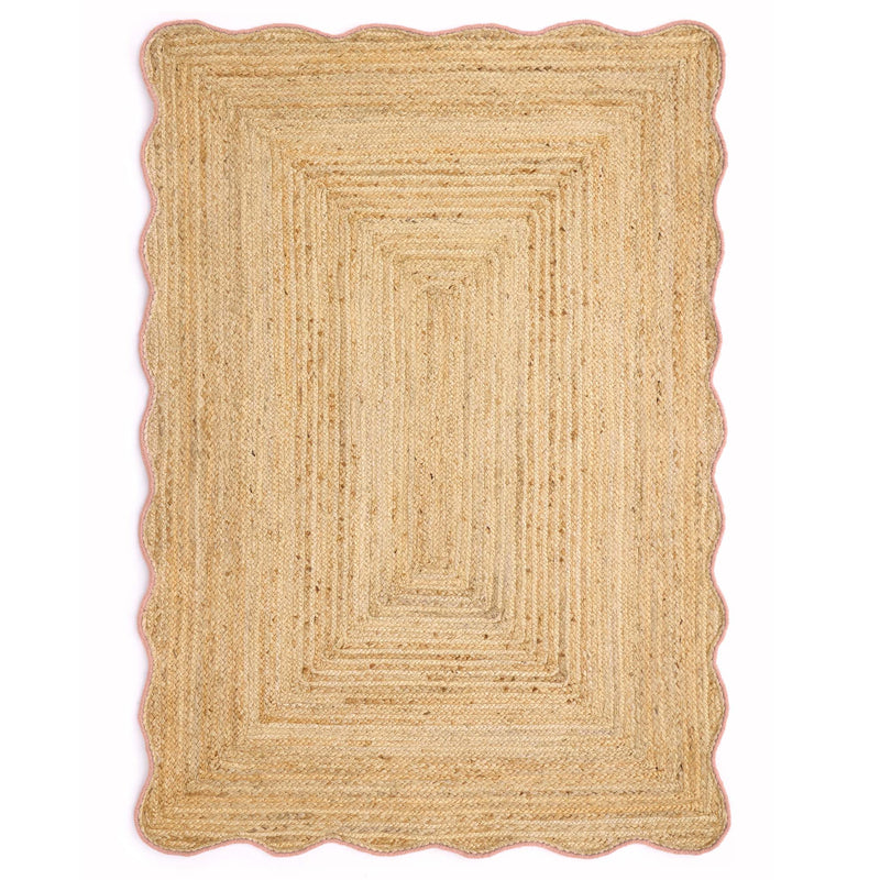 Jute Scalloped Edge Peach Rug - a 100% jute rug featuring a pink scalloped border.