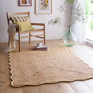 Jute Scalloped Edge Yellow Rug- Jute scalloped edge rug with yellow wool whipped border.