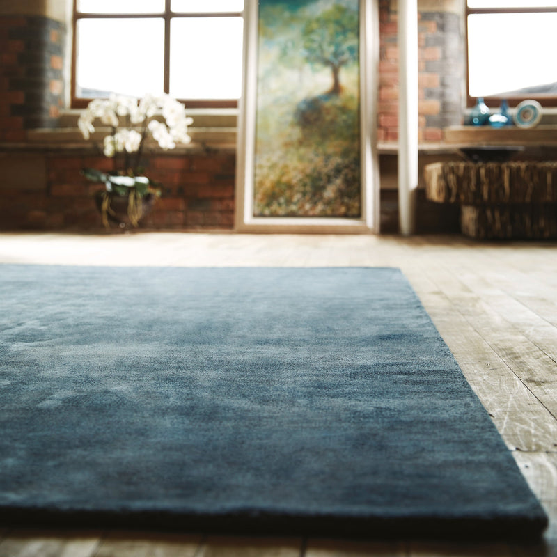 Karma Aegean Rug made from 100% viscose, featuring different shades of blue. 