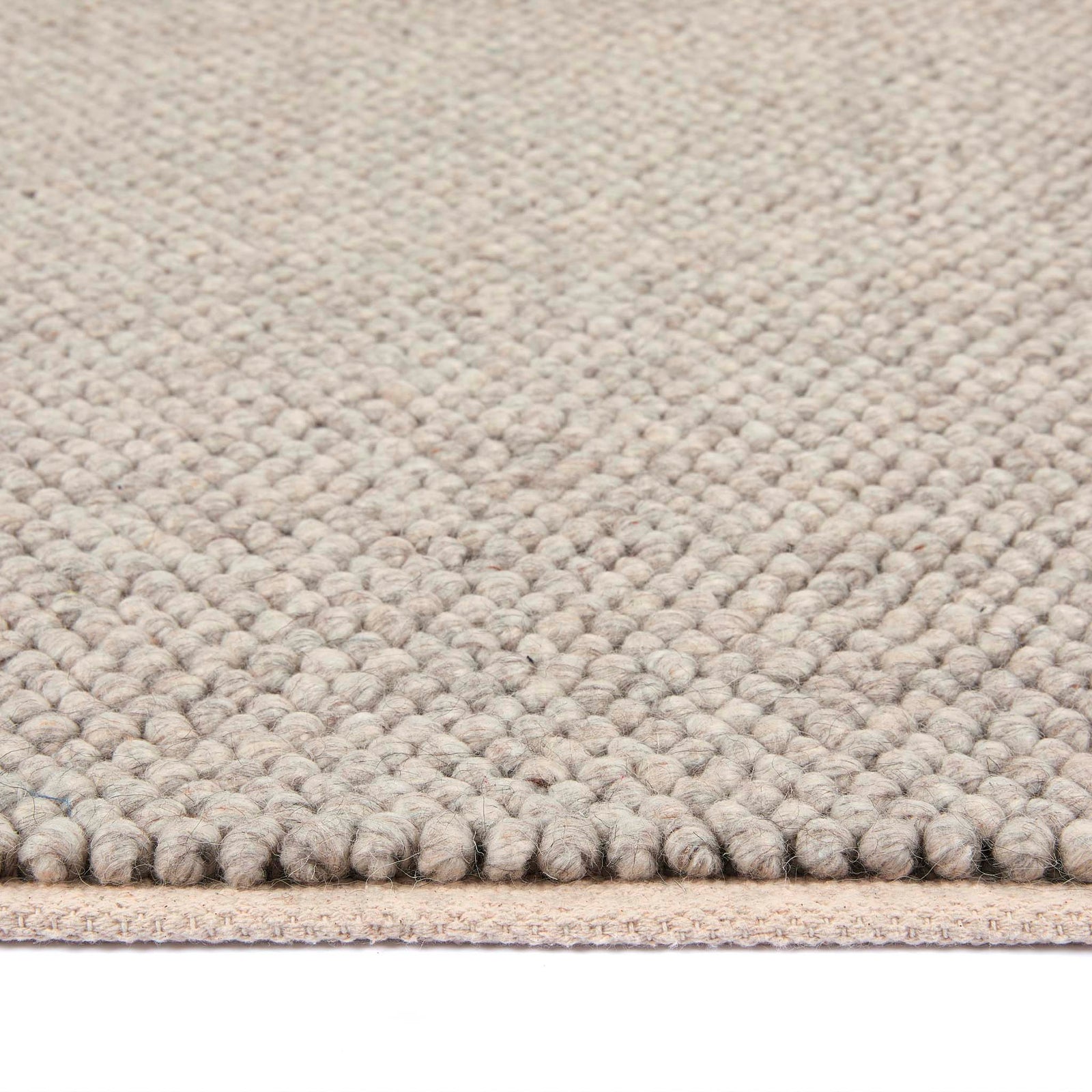 Close up of La Playa Natural Runner showing its pile height and its textured design.