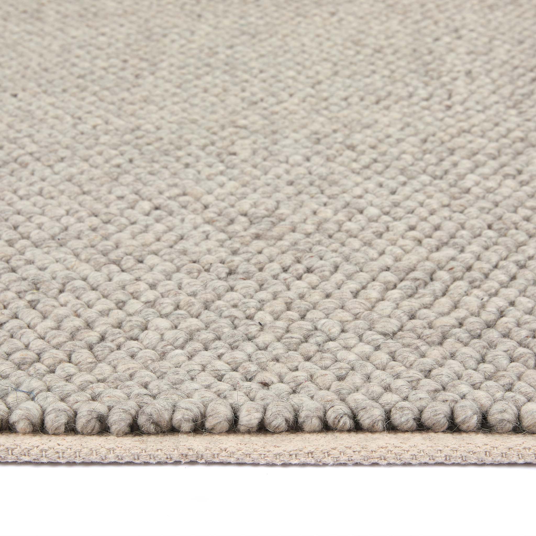 Close up of La Playa Natural Runner showing its pile height and its textured design.