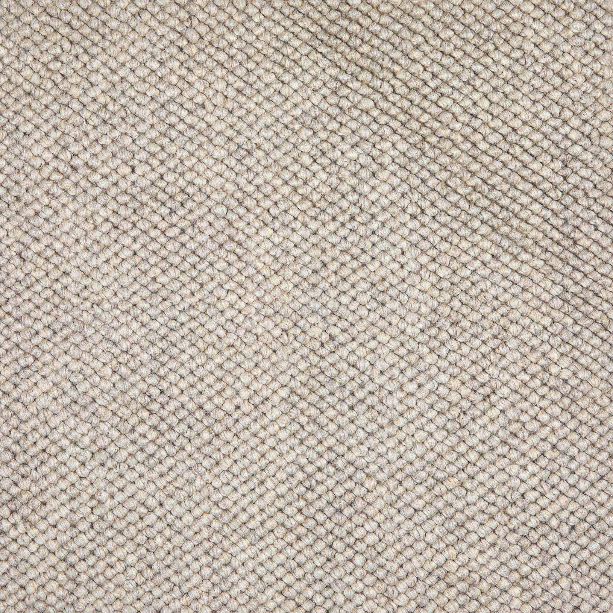 Close-up of La Playa Natural Rug with a textured pattern. 