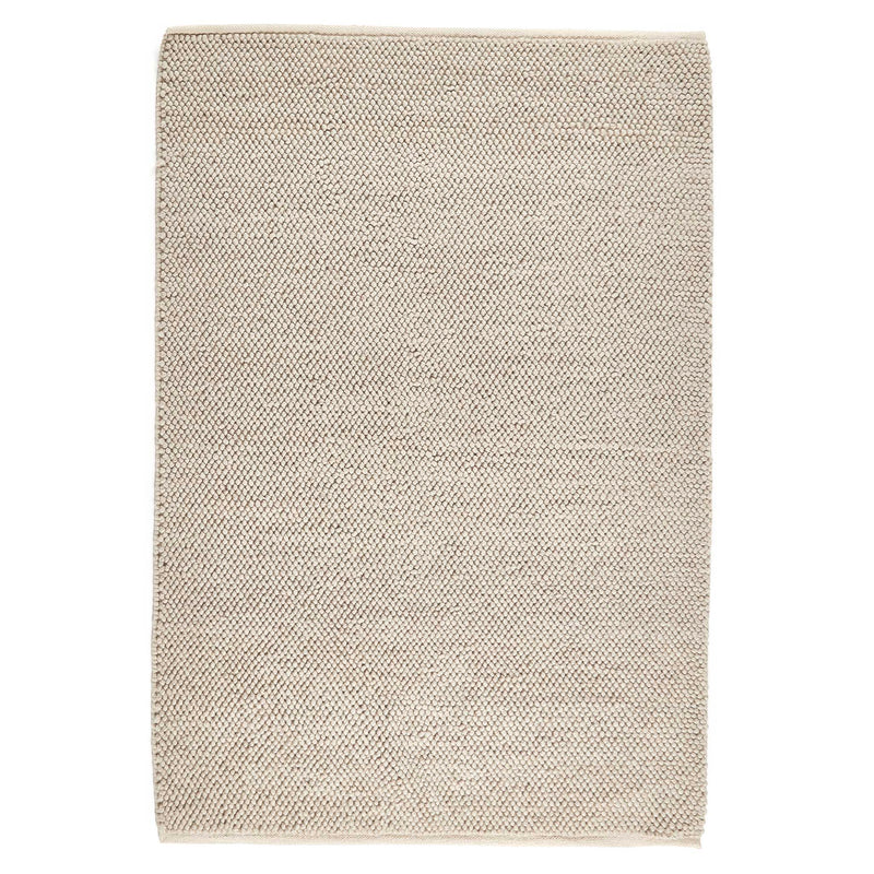 La Playa Natural Rug with a textured design.