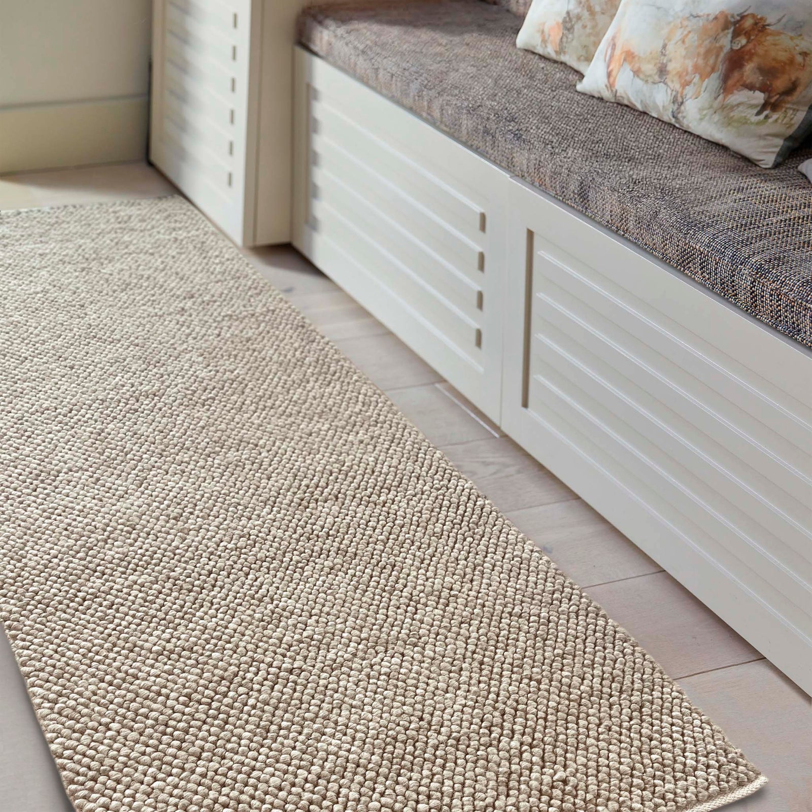Close up of La Playa Natural Runner with a textured design, styled in an entryway.