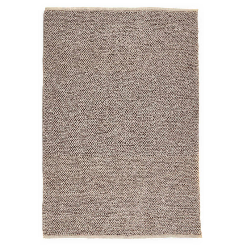 La Playa Rustic Brown Rug with a textured design. 