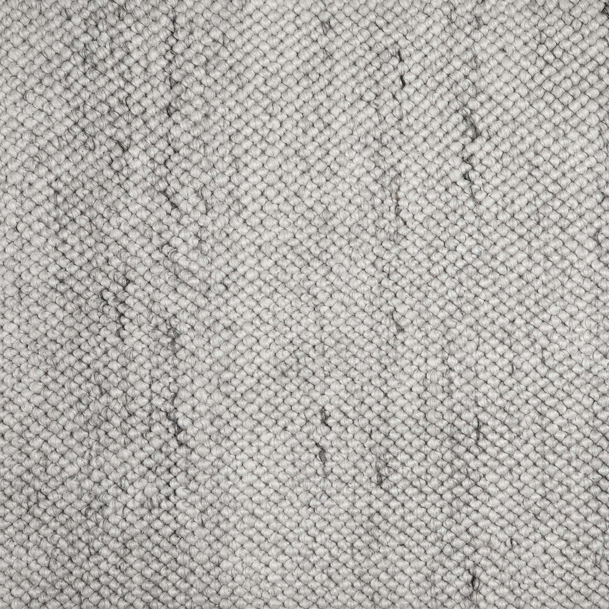 Close-up of La Playa Silver Grey Rug showing the textured design.