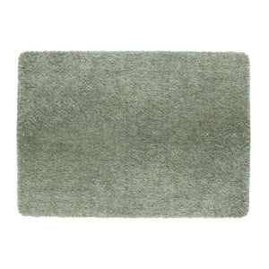 Luxe Green Rug with a shaggy pile in green.