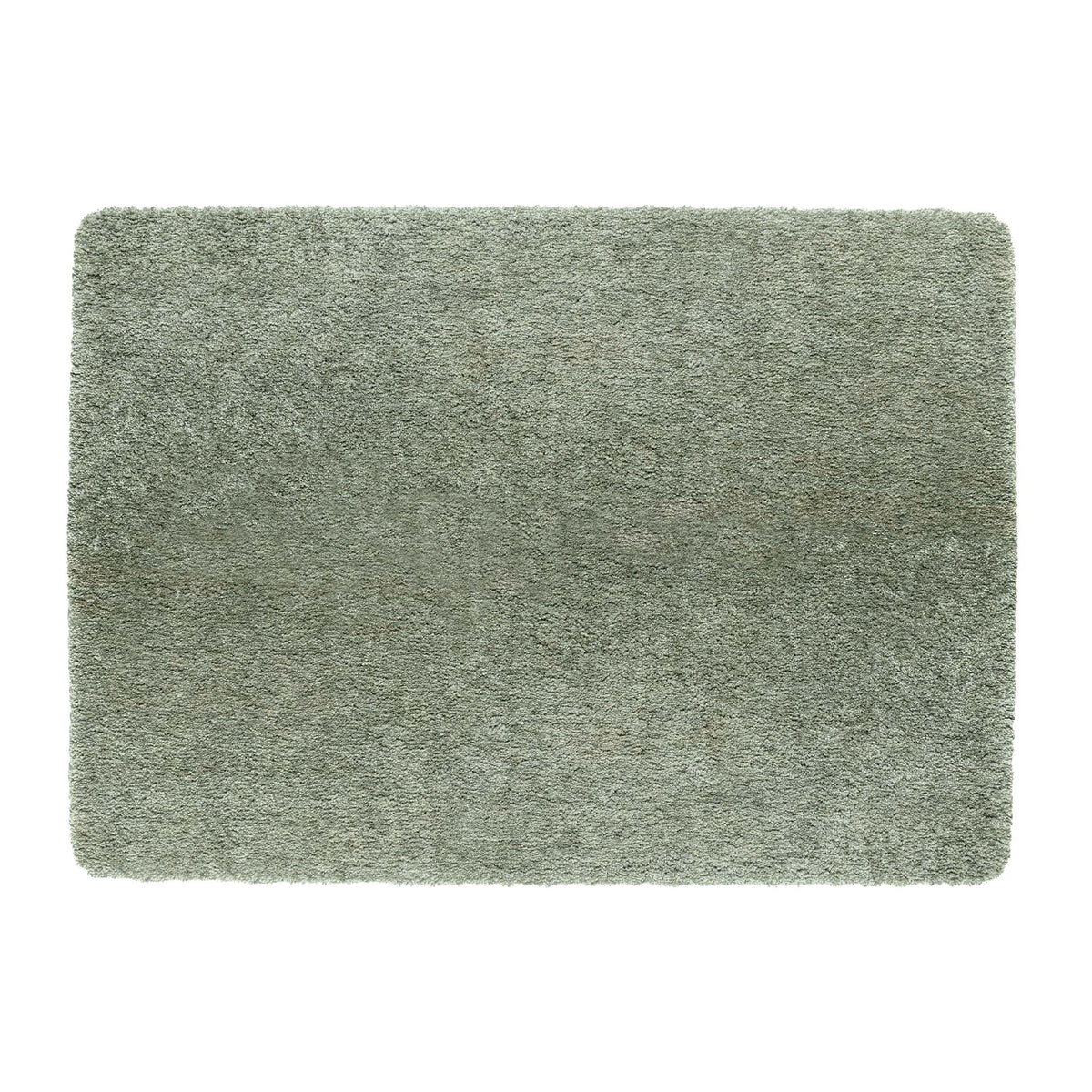 Luxe Green Rug with a shaggy pile in green.