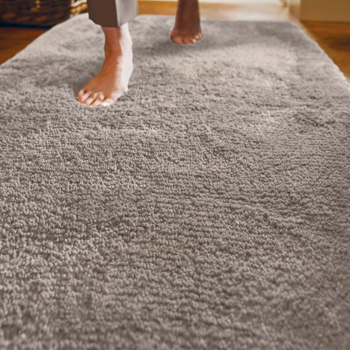 Luxe Stone Runner with a shaggy brown pile, styled on wooden flooring.