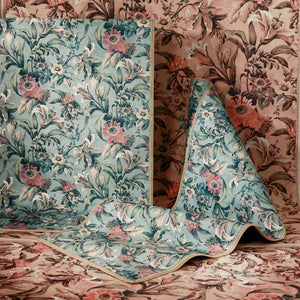 Lys Blue Eco-Washable Rug with a floral design. 