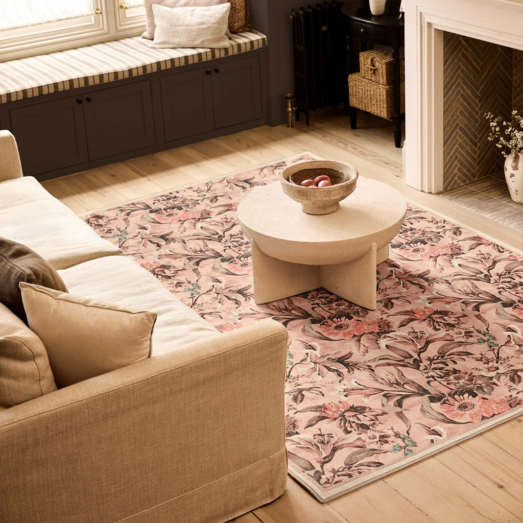 Lys Pink Rug Eco-Washable Rug with a flroal design, styled in a living room.