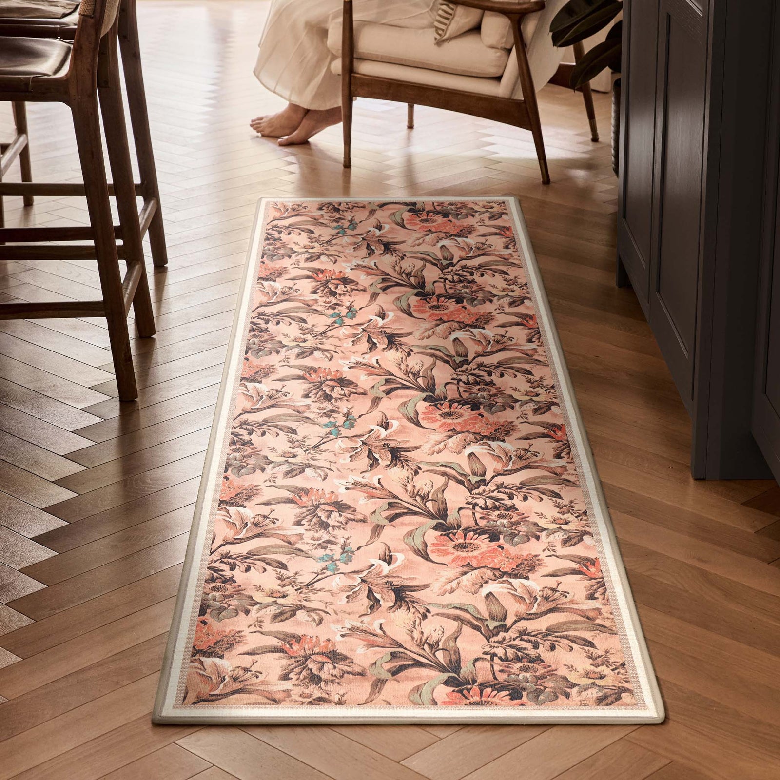 Lys Pink Eco-Washable Runner with a floral design, styled on wooden flooring. 