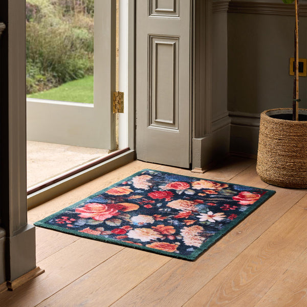 Midnight Blooms Washable Doormat-  a cotton floral doormat featuring roses, chrysanthemums, daises, and wild blooms.