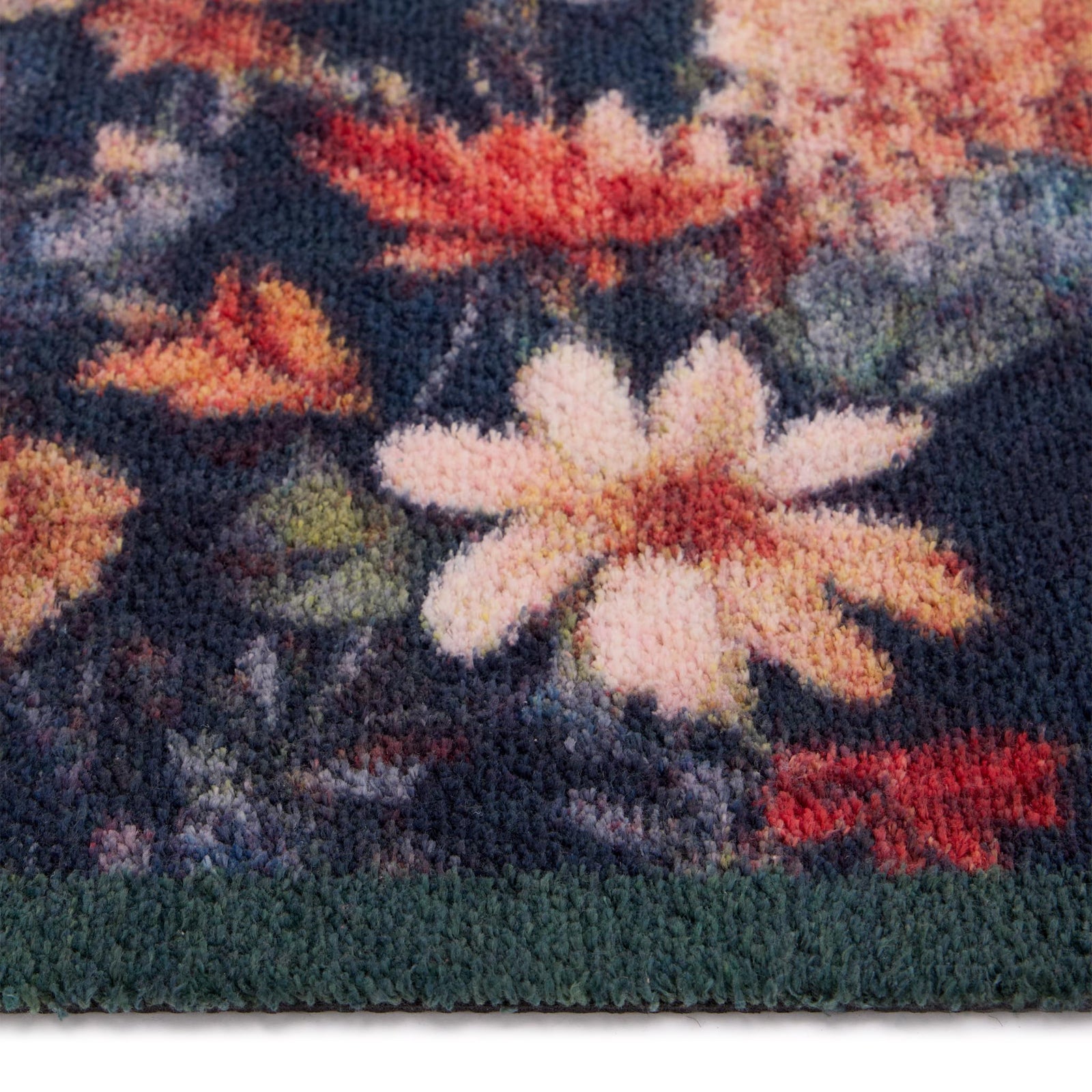 Midnight Blooms Washable Runner- a 100% recycled cotton runner featuring roses, chrysanthemums, daisies, and wild blooms in shades of red, orange, peach, cream, and yellow.