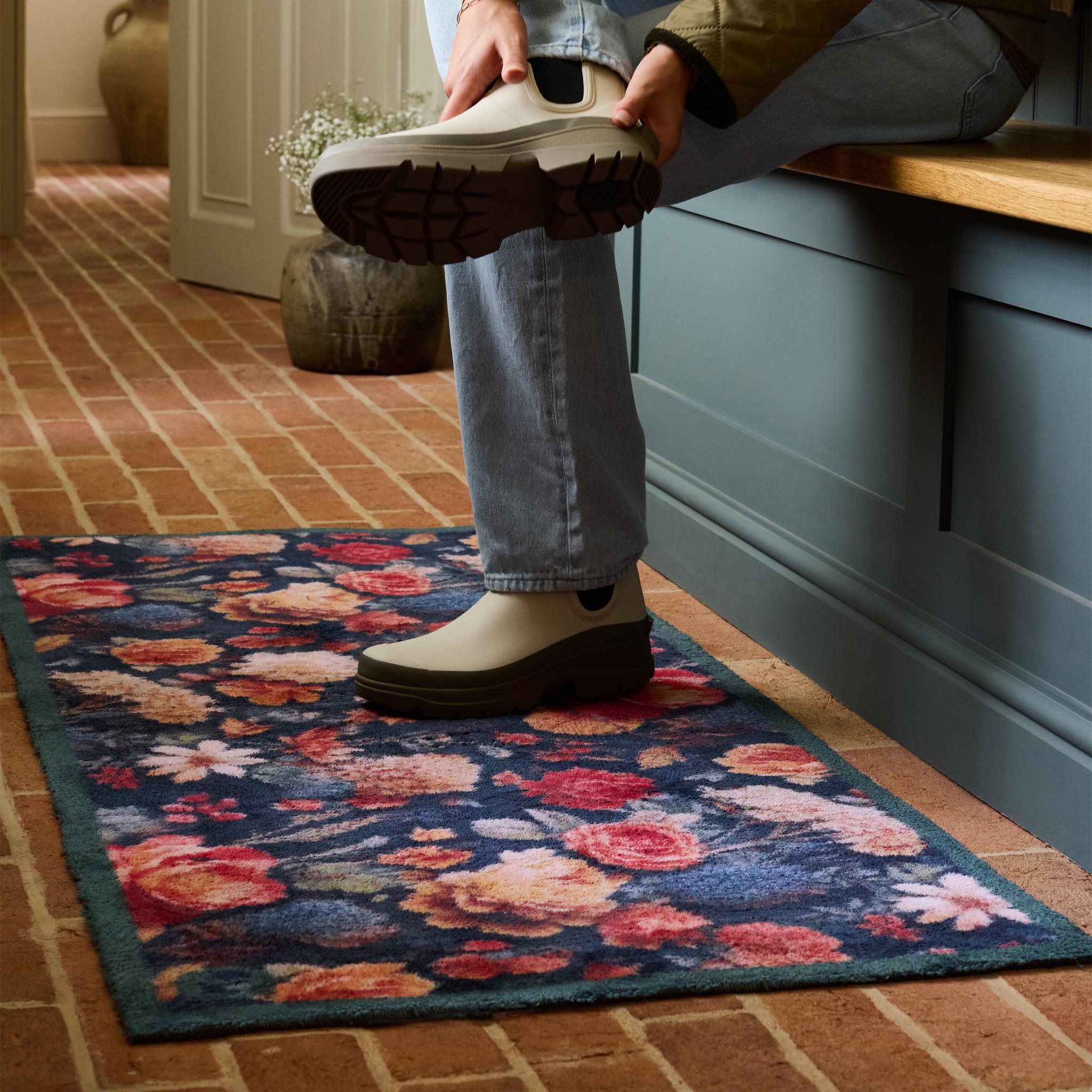 Midnight Blooms Washable Doormat-  a cotton floral doormat featuring roses, chrysanthemums, daises, and wild blooms.