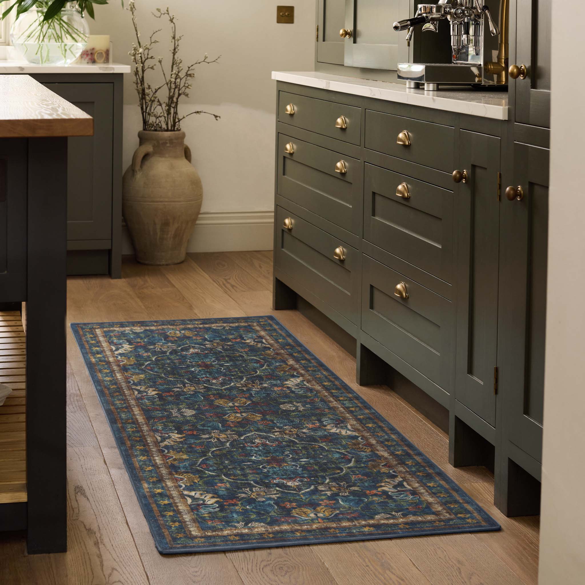 Midnight Paisley Blue Eco-Washable Runner with a Persian inspired pattern, styled in a kitchen.