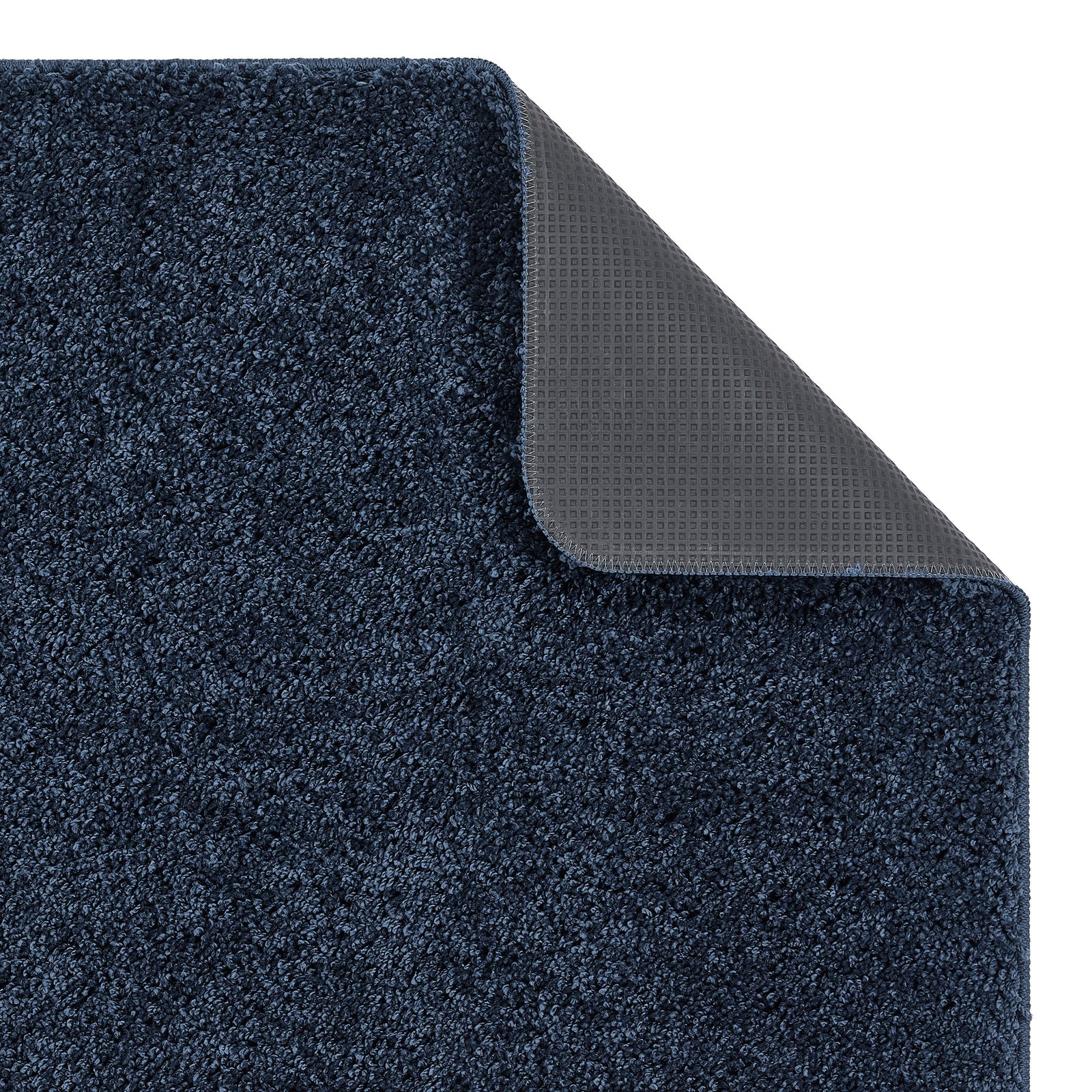 Midnight Blue Washable Rug in a solid dark blue colour, fully machine washable.