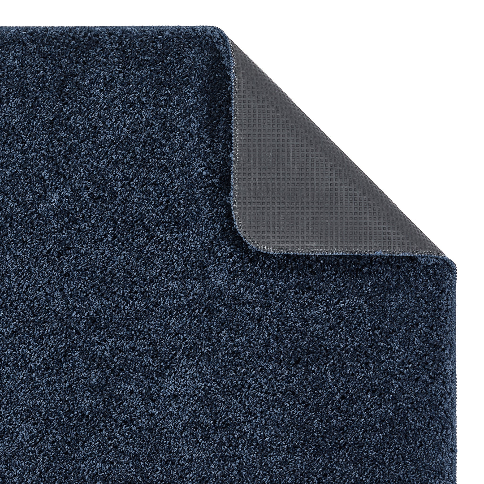 Midnight Blue Washable Rug in a solid dark blue colour, fully machine washable.