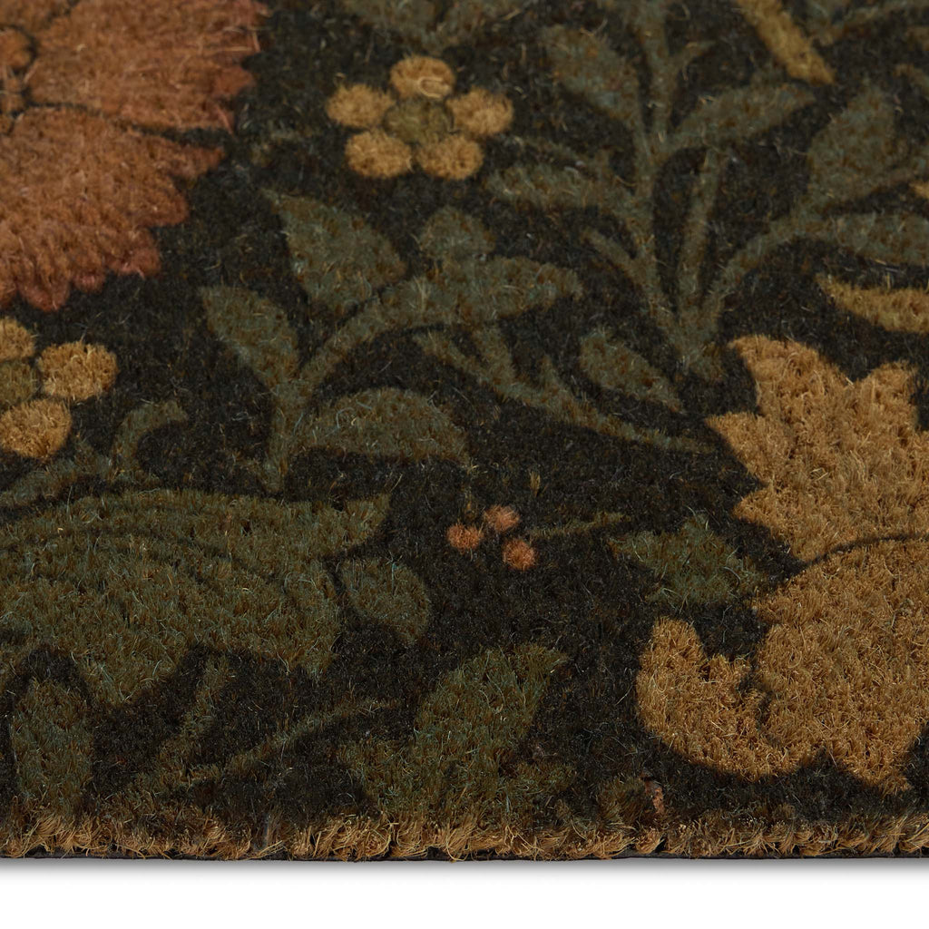 Crompton Coir Doormat- made from eco-friendly materials featuring a floral leaf design.