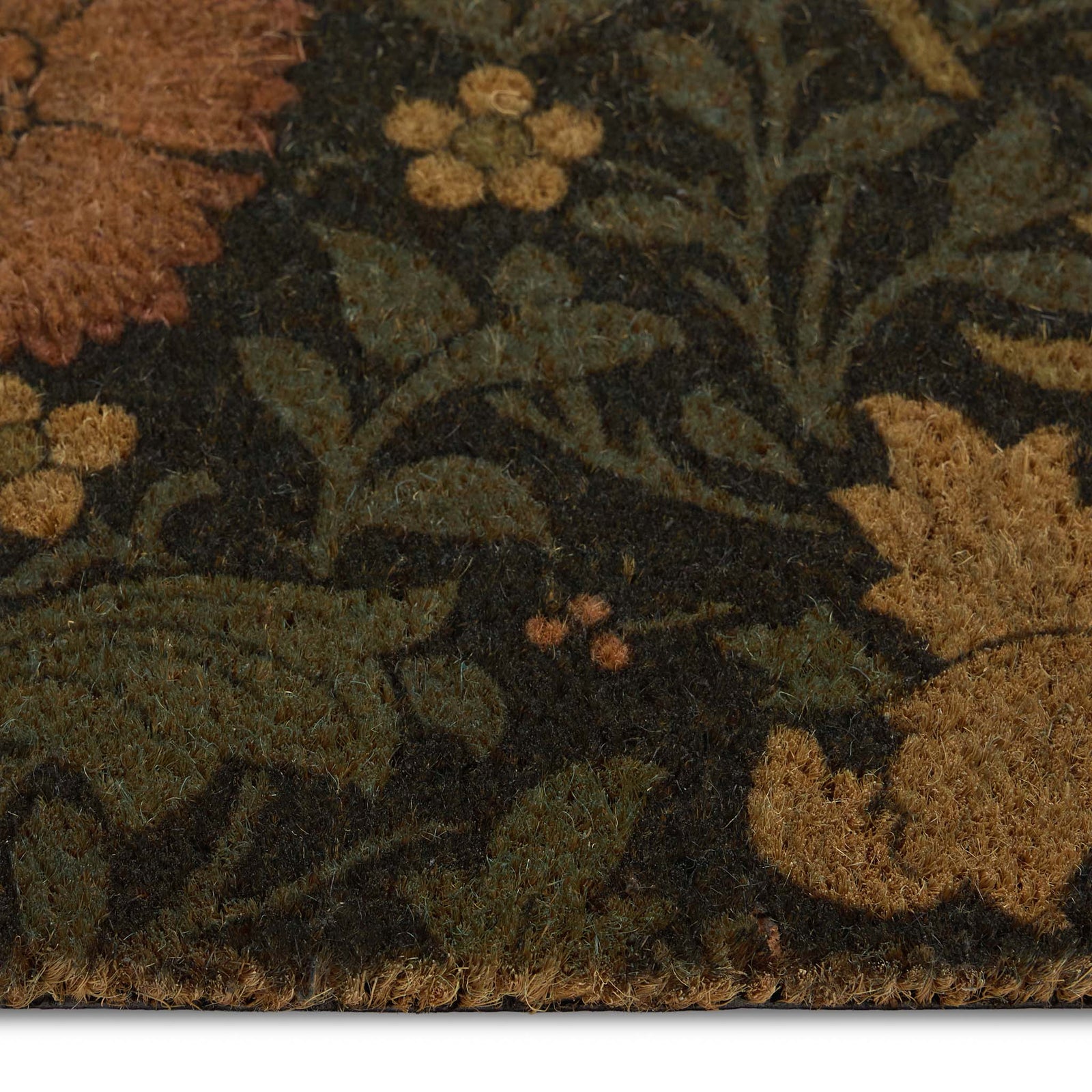 Compton Coir Doormat- made from eco-friendly materials featuring a floral leaf design.