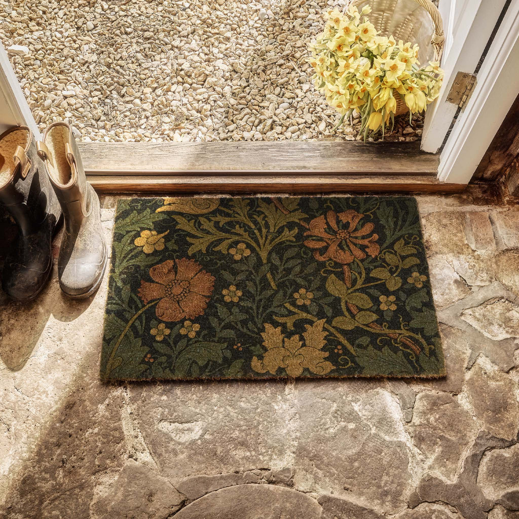 Crompton Coir Doormat- made from eco-friendly materials featuring a floral leaf design.