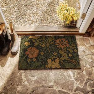 Crompton Coir Doormat- made from eco-friendly materials featuring a floral leaf design.