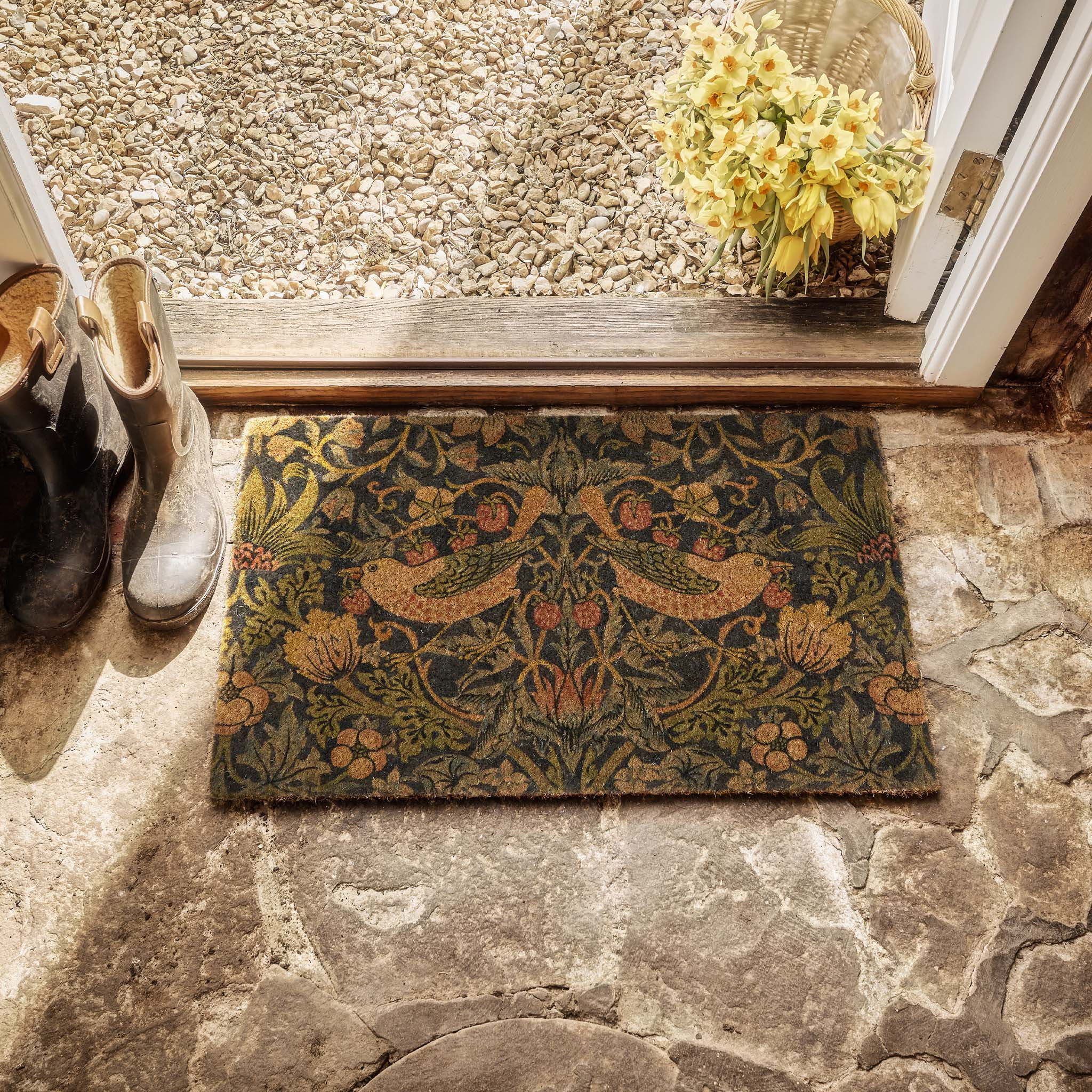 Strawberry Thief Navy Coir Doormat- made from eco-friendly materials featuring birds stealing strawberries.