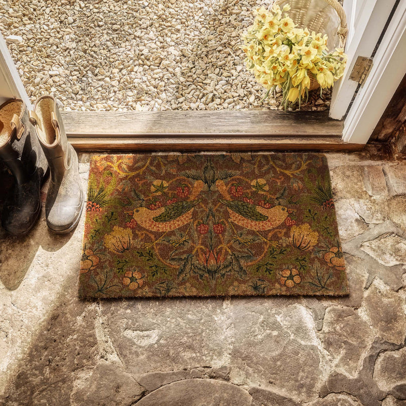 Strawberry Thief Red Coir Doormat- made from 100% eco-friendly materials featuring birds stealing strawberries.