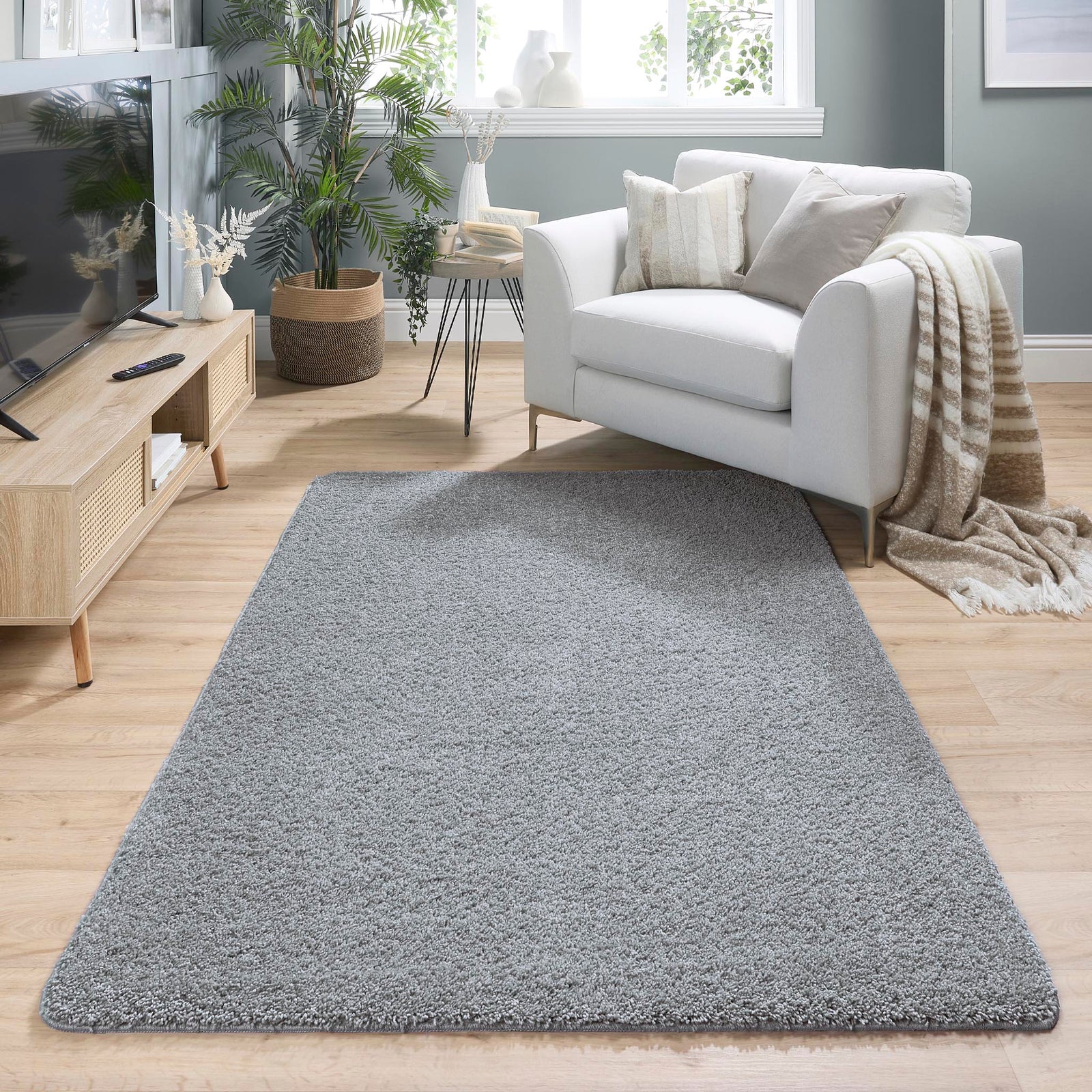 My Rug Blue Fleck Washable Rug with a blue fleck shaggy design, styled in a living room.