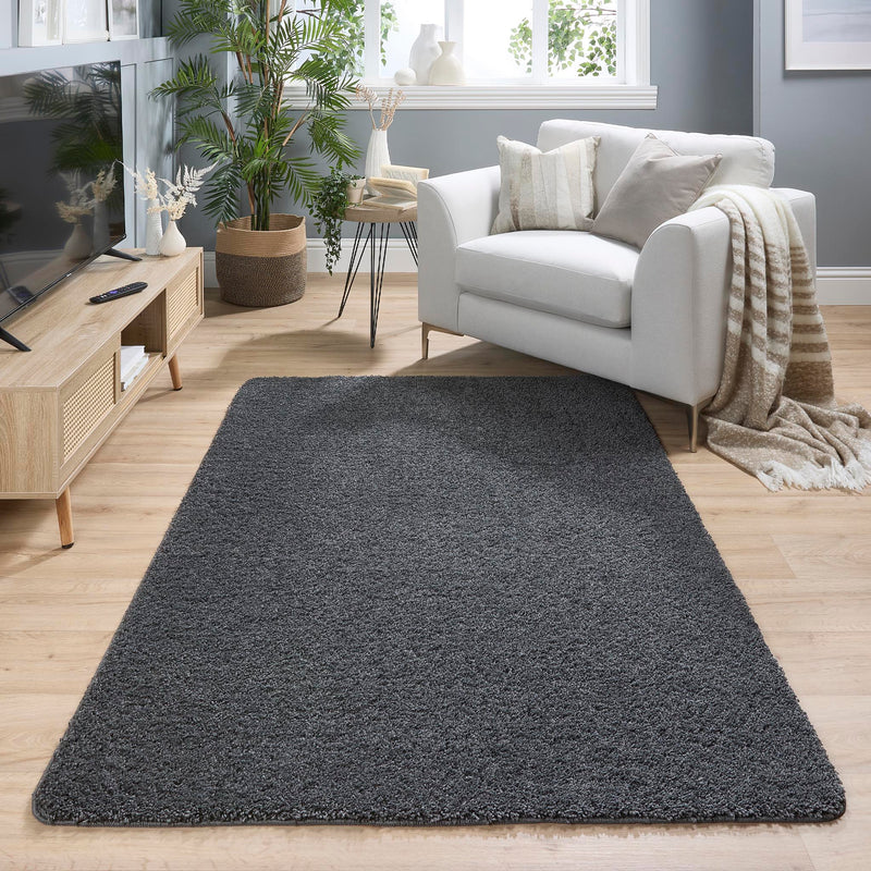 Charcoal Washable Rug in a solid dark grey colour, fully machine washable.