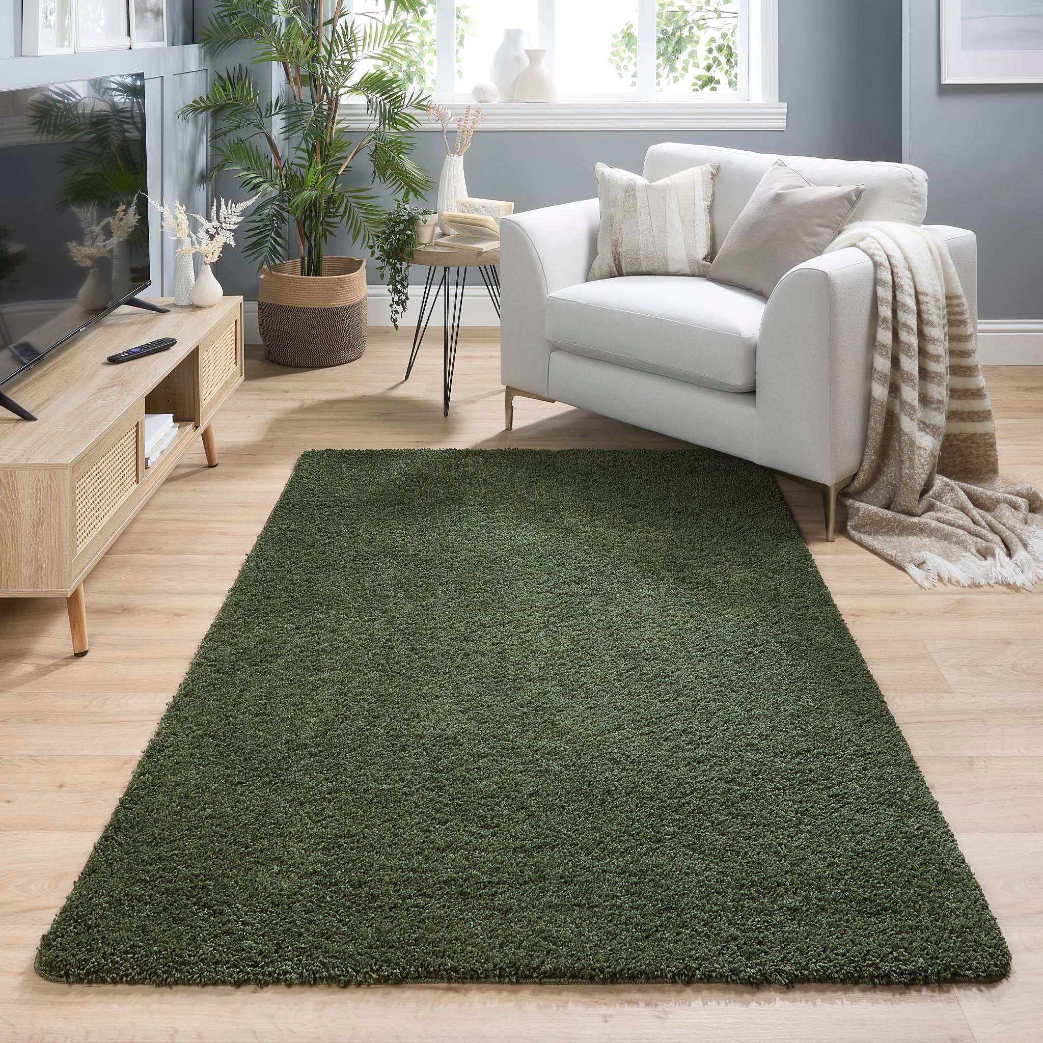 Forest Green Washable Rug in a solid green colour, fully machine washable.