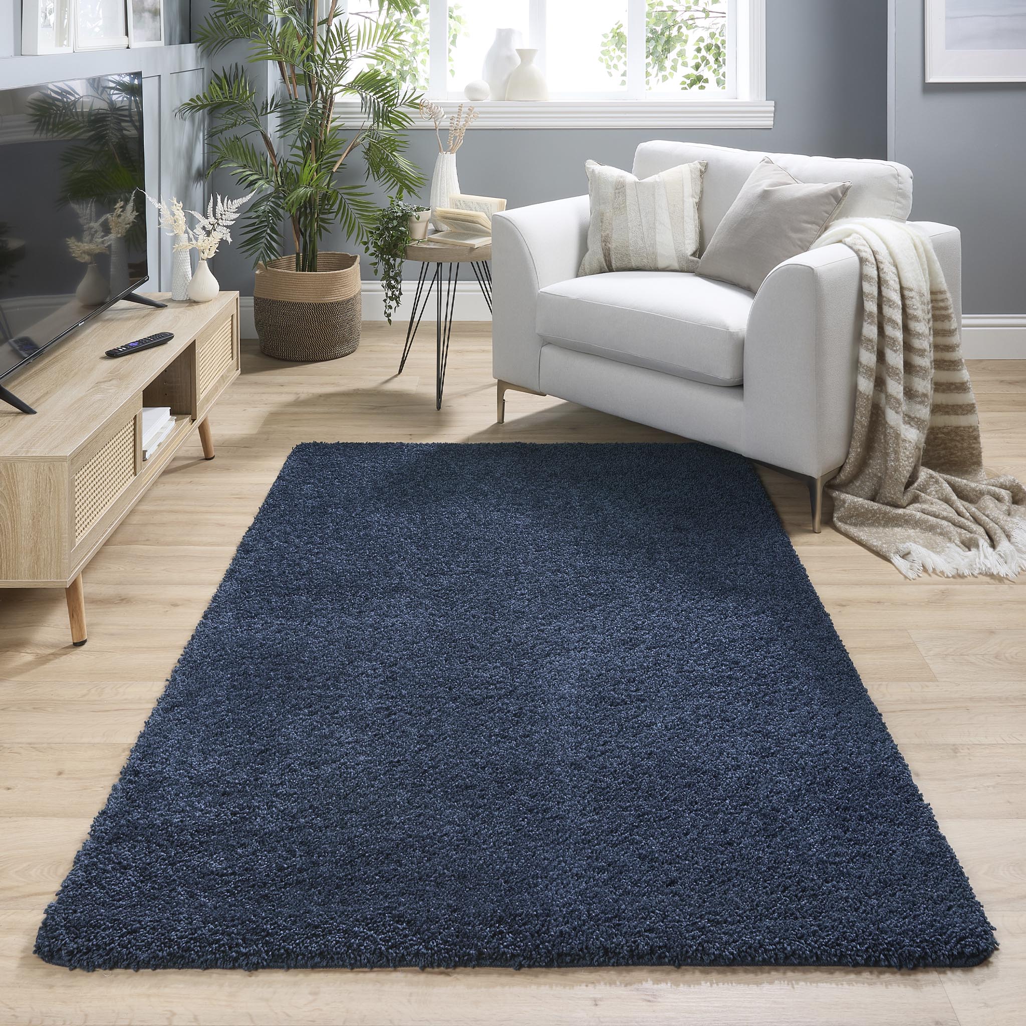 Midnight Blue Washable Rug in a solid dark blue colour, fully machine washable.