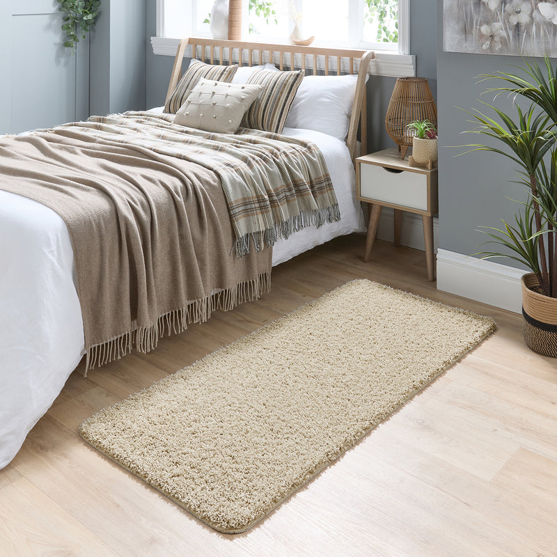My Rug Stone Beige Runner with a shaggy pile, styled by the bed.