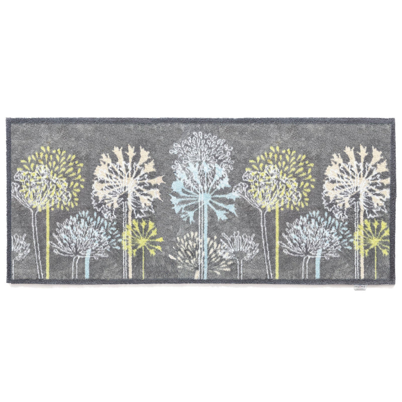 Nature 17 Dandelions Grey Runner- a 100% recycled cotton runner featuring a horizontal row of dandelions in various sizes, in lime green, yellow, white, and light blue.
