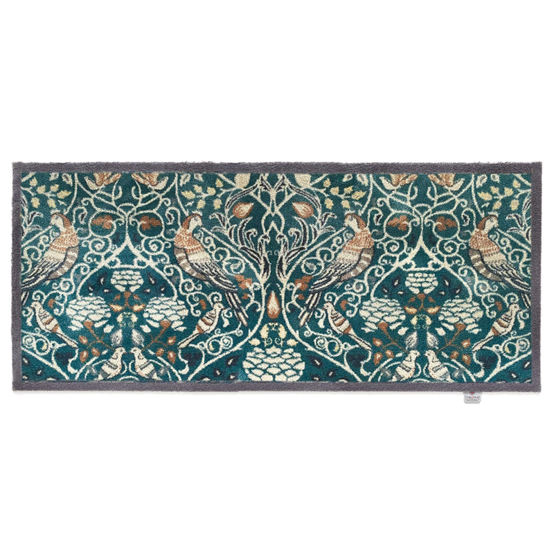 Nature 25 Washable Runner- a 100% recycled cotton runner featuring birds in off-white, beige, brown, and black among foliage.