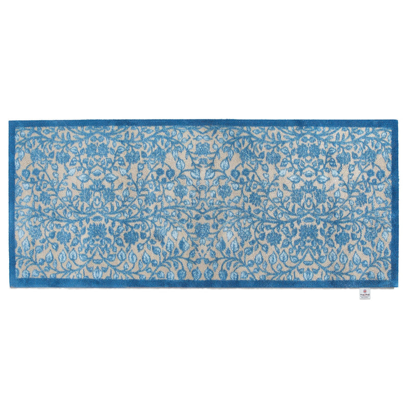 Nature 33 Washable Runner in Beige- a 100% recycled cotton runner featuring intertwining floral pattern in various shades of blue.