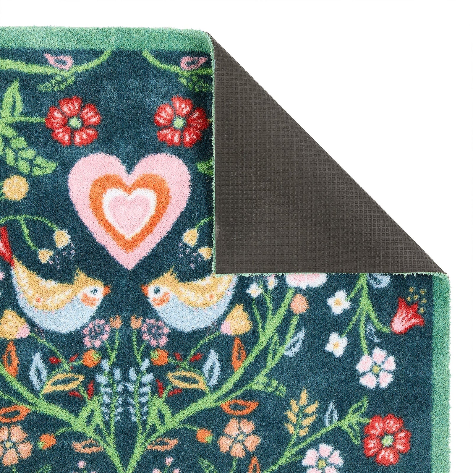 Nature 35 Love Birds Washable Runner in a dark blue- a 100% recycled cotton runner featuring a symmetrical pattern of intertwined branches adorned with colourful leaves and flowers.