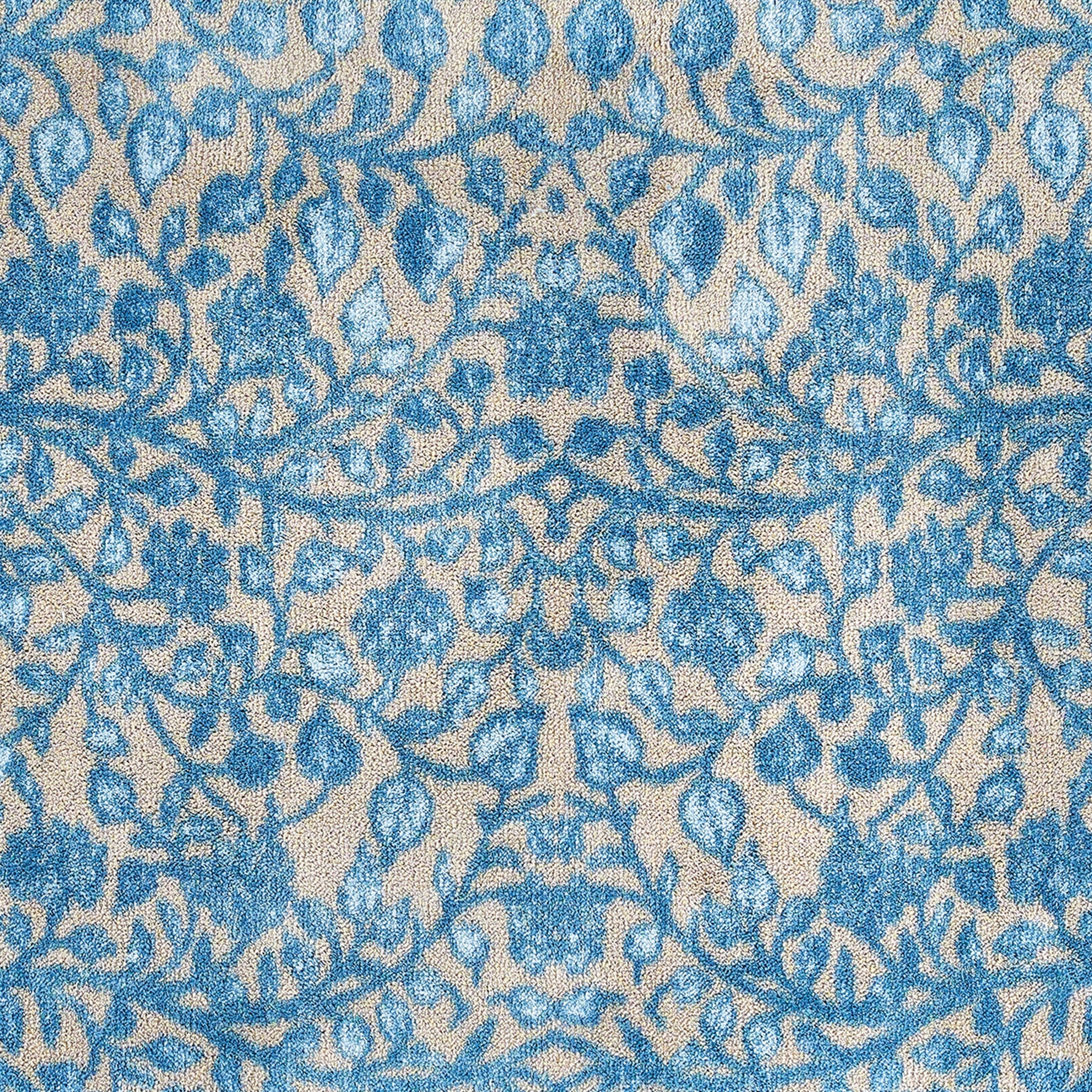 Nature 33 Washable Runner in Beige- a 100% recycled cotton runner featuring intertwining floral pattern in various shades of blue.