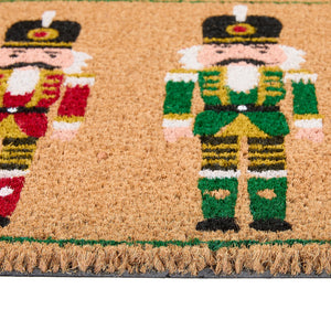 Christmas Nutcracker Coir Doormat with three colourful nutcrackers.