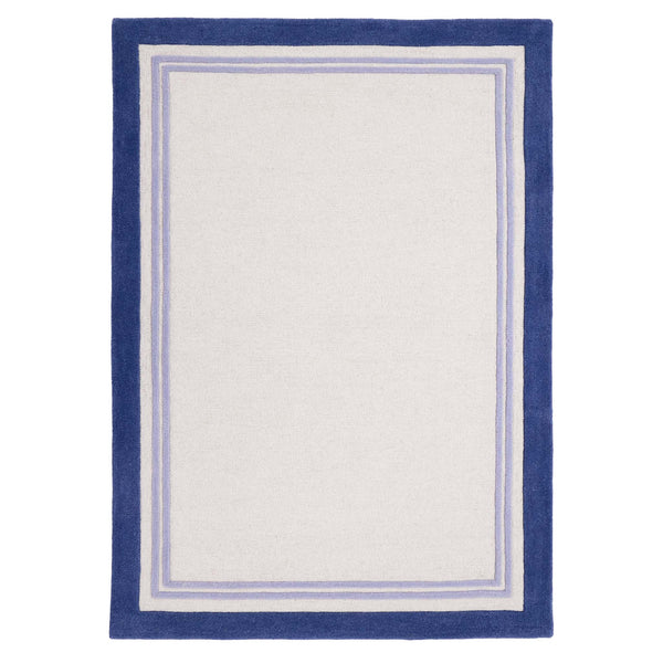 Piper Rug Navy- 100% wool rug with a purple and blue border.