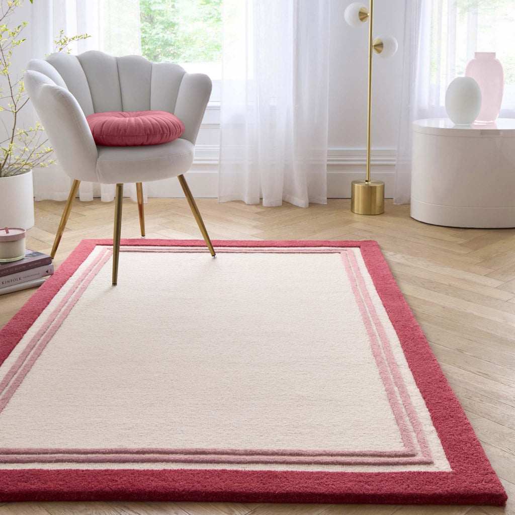 Piper Rug- a 100% wool rug with a raspberry border. 